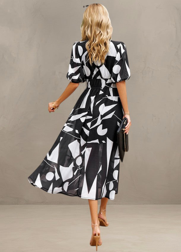 Light Mode | FLATTERING FLORAL MIDI DRESS