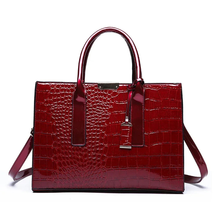 Women's crocodile print handbag