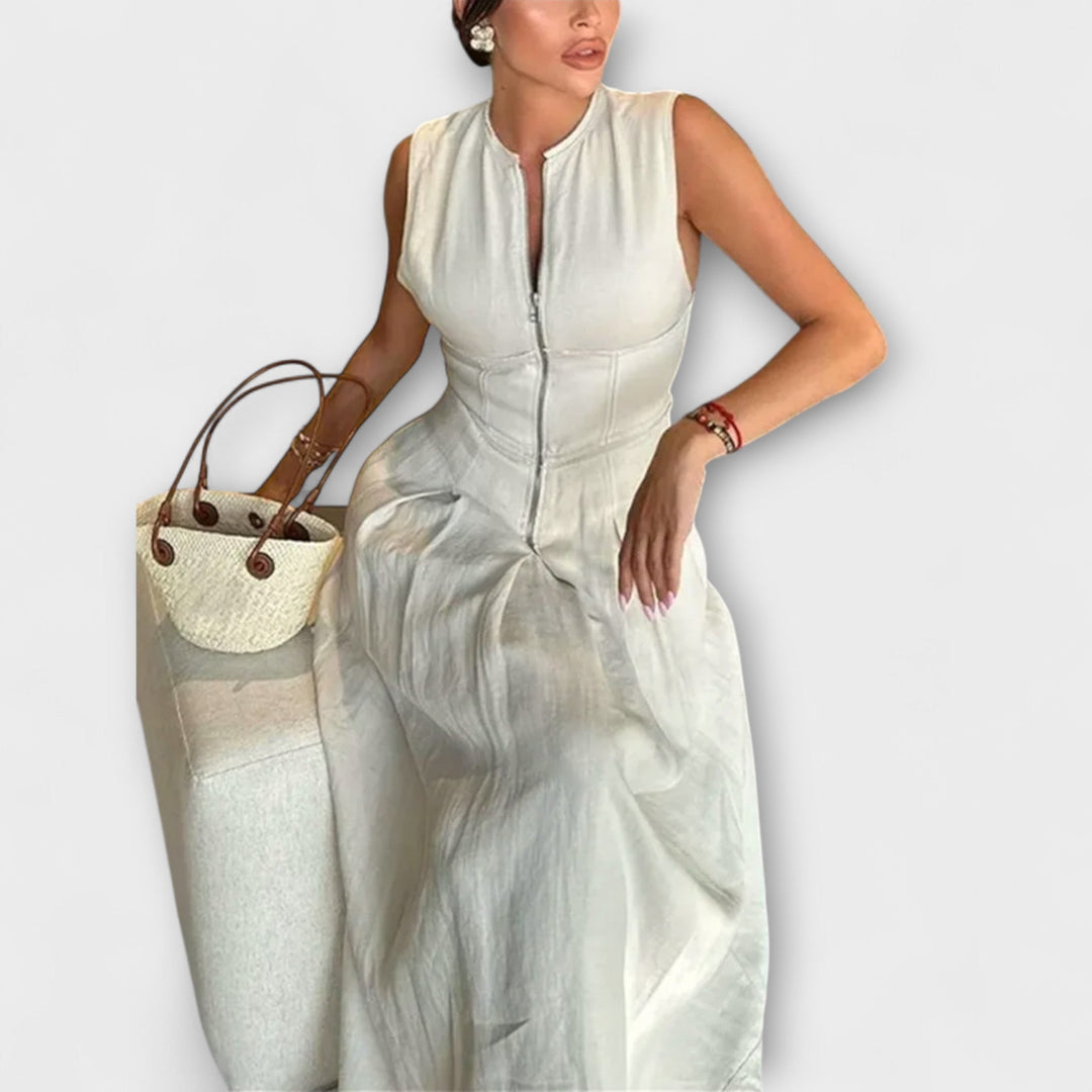Sleeveless short dress with pleats and a fitted midi cut
