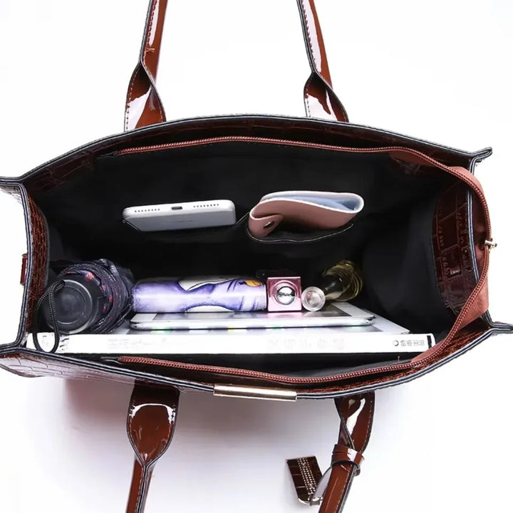 Women's crocodile print handbag
