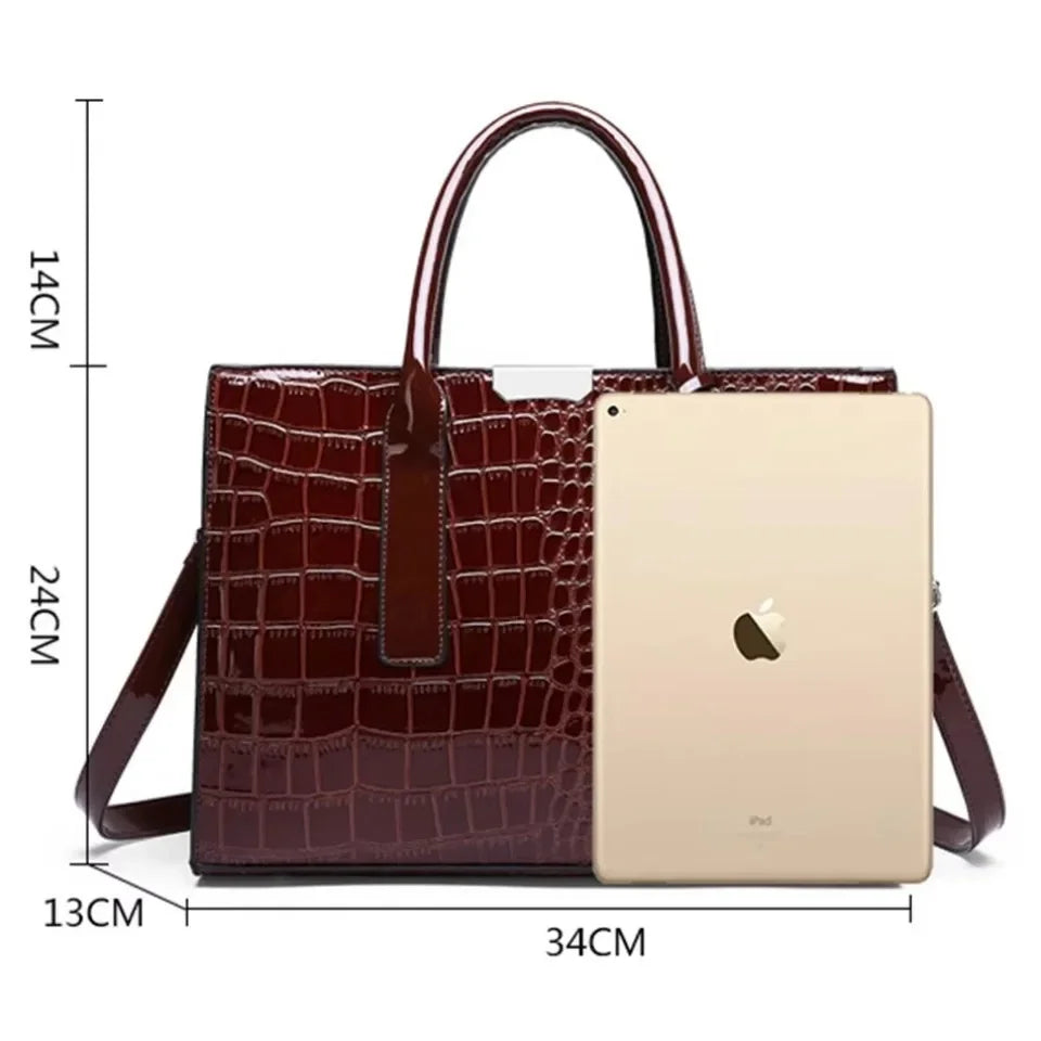 Women's crocodile print handbag
