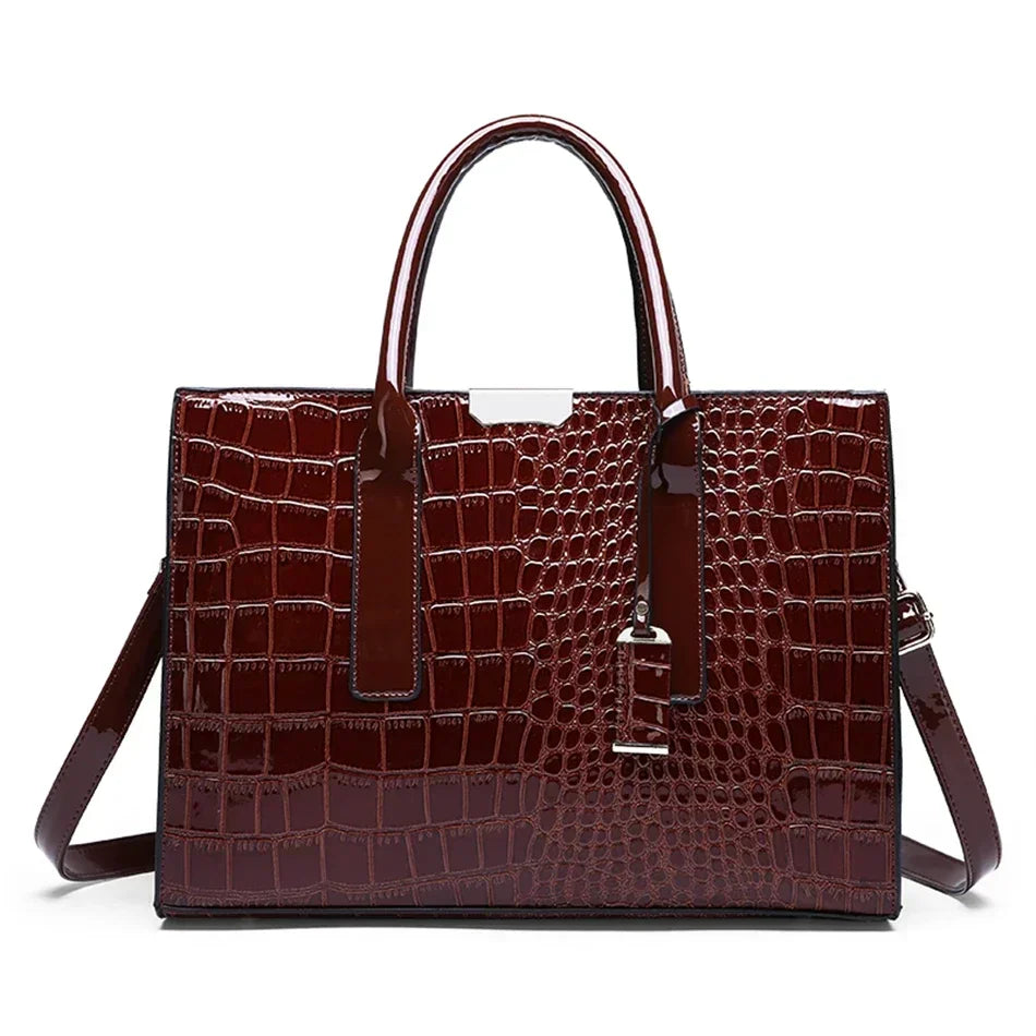 Women's crocodile print handbag
