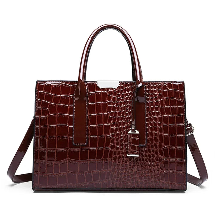 Women's crocodile print handbag