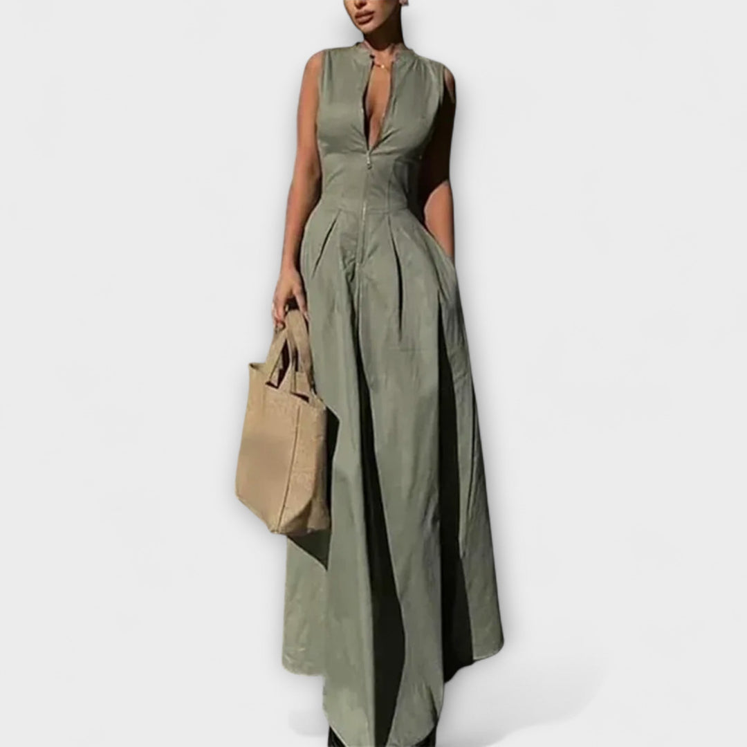Sleeveless short dress with pleats and a fitted midi cut